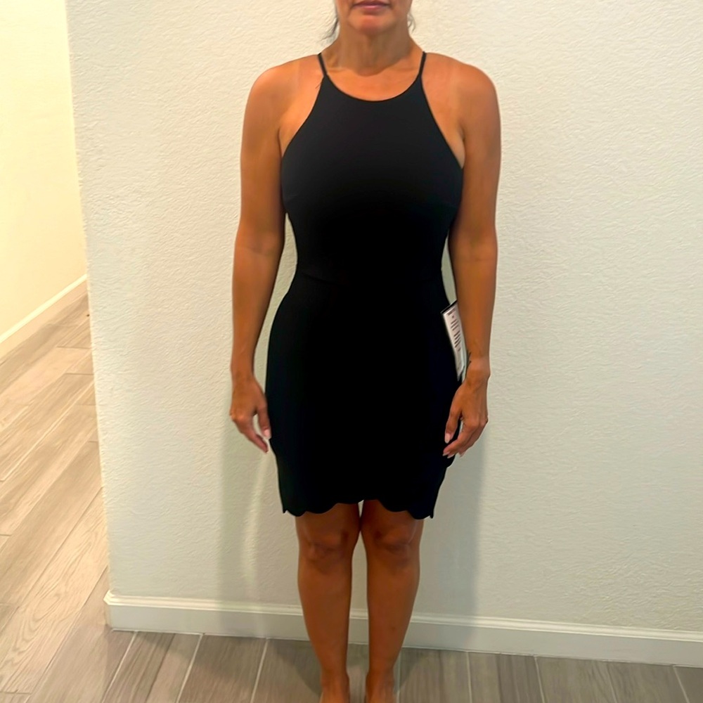 New! Emerald Sunday Black racer back dress.